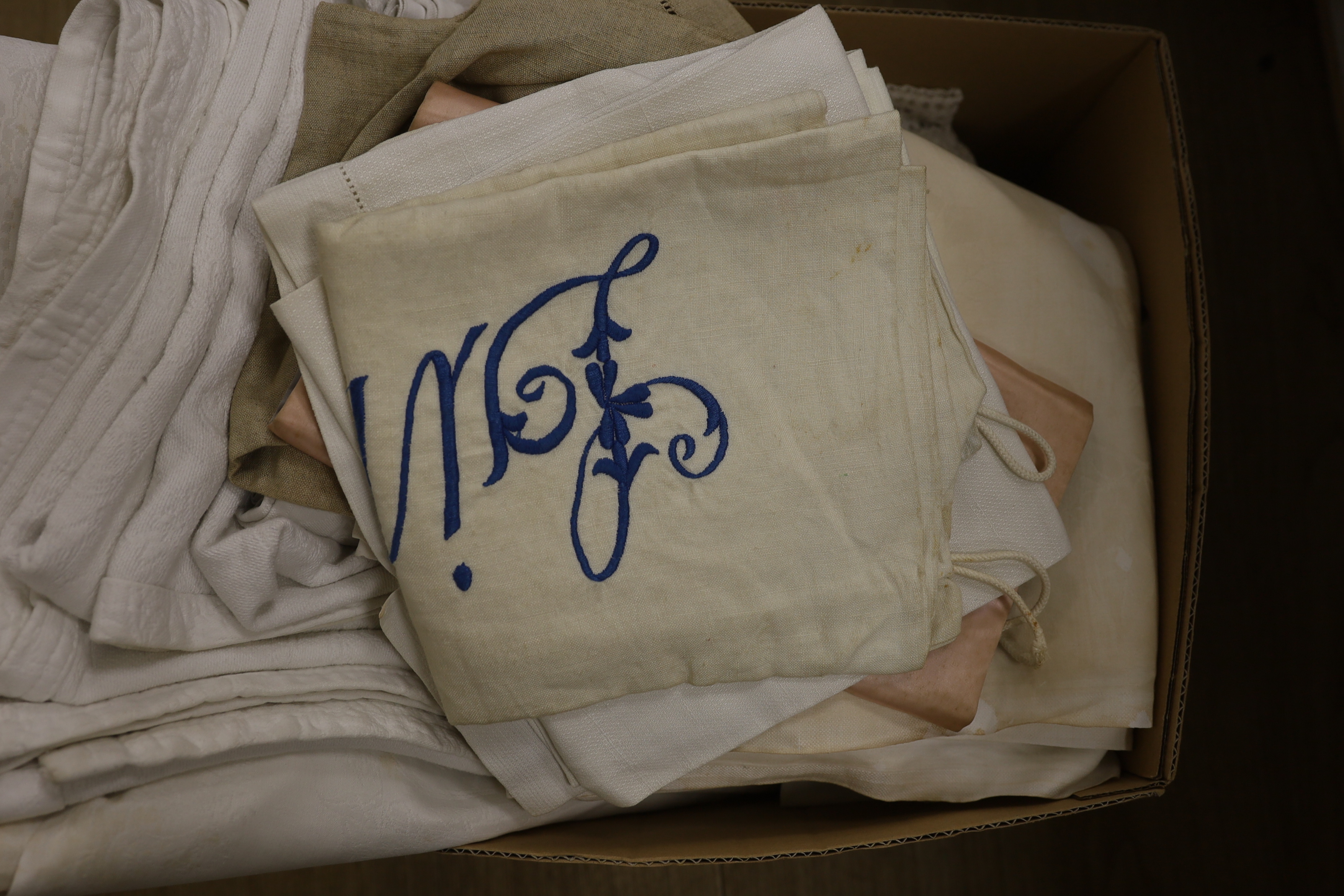 A damask linen table cloth with swan design, various table linens, watered silk embroidered bag, etc